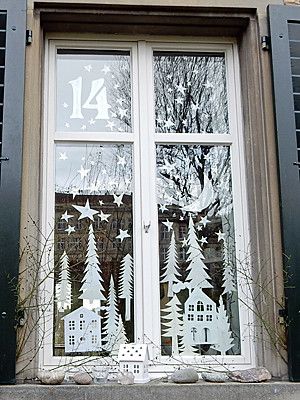 decorar janelas com enfeites de natal de papel 6